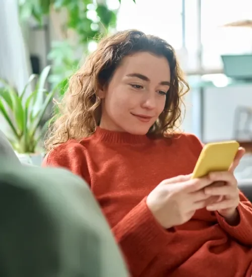 Customer Giving Feedback From Her Phone