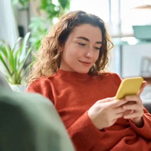 Customer Giving Feedback From Her Phone
